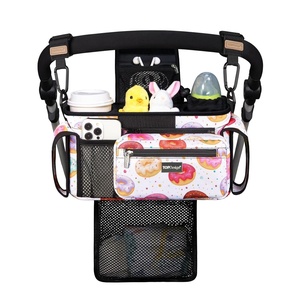 image:imageTOPDesign Universal Baby Stroller Organizer Stroller Caddy with Detachable Mesh Bag amp Heightened Insulated Cup Holders amp NonSlip Secure Hooks Accessories Fits Most Strollers BlackDonuts